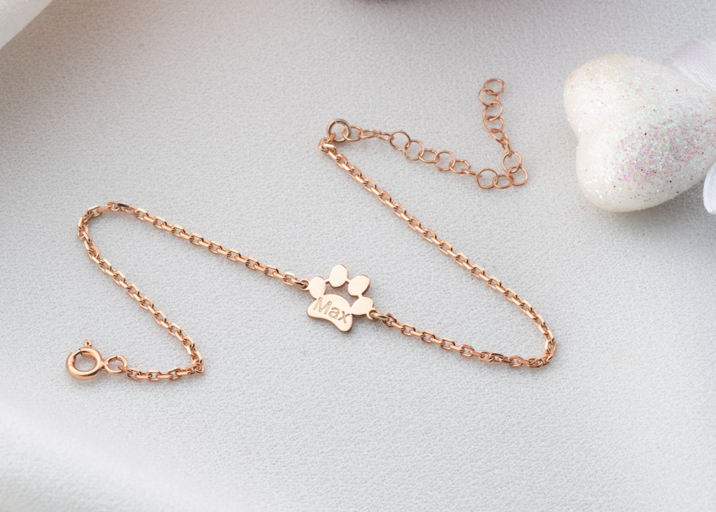 Braccialetto con ciondolo a forma di zampa