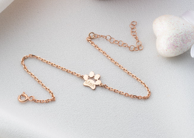 Braccialetto con ciondolo a forma di zampa