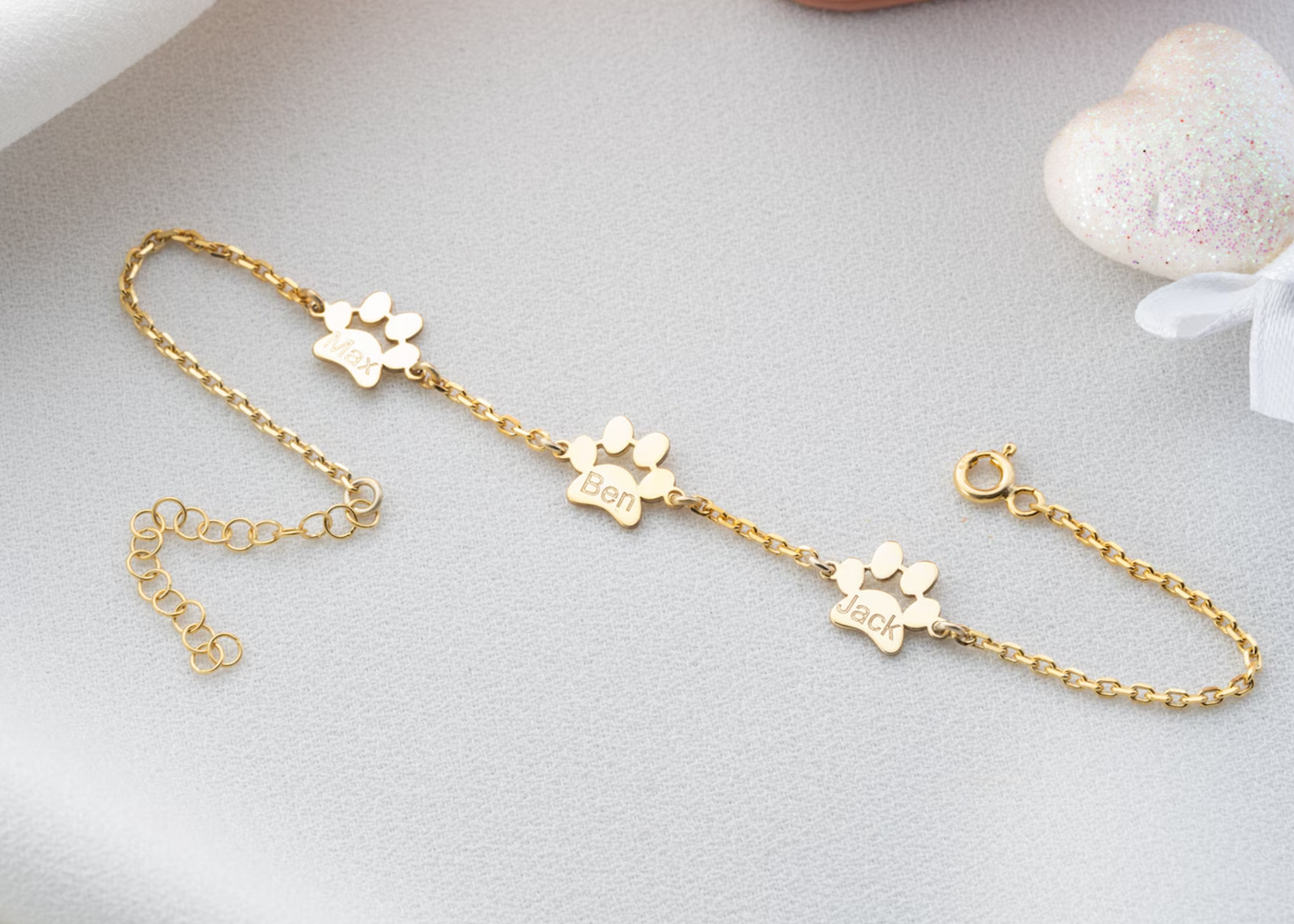 Braccialetto con ciondolo a forma di zampa