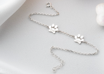 Braccialetto con ciondolo a forma di zampa