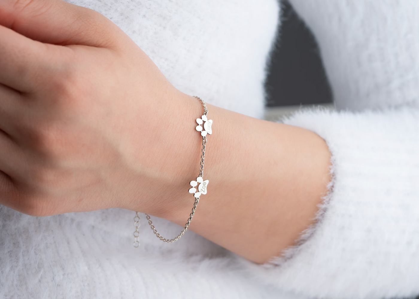 Braccialetto con ciondolo a forma di zampa